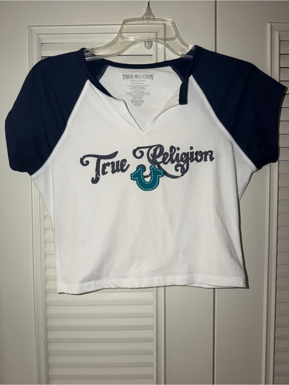 True Religion White Crop Top with Navy Sleeves and Teal Horseshoe